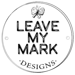 May include: Black and white logo design with a butterfly and the text "Leave My Mark Designs."