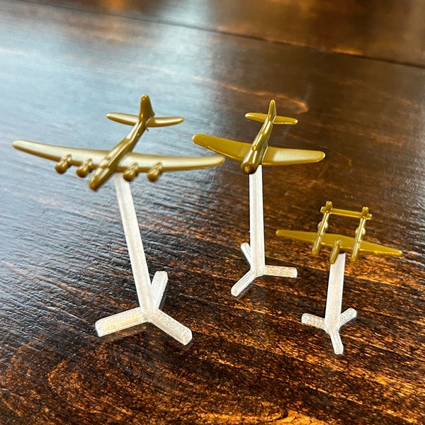 Simple Flight-Stands for board games like Axis and Allies, Twilight Imperium, and more! 3 heights and two base sizes options available.