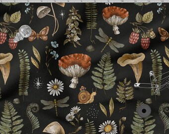 May include: Black fabric with a repeating pattern of mushrooms, ferns, dragonflies, daisies, raspberries, and butterflies. The pattern is in shades of green, brown, red, and white.
