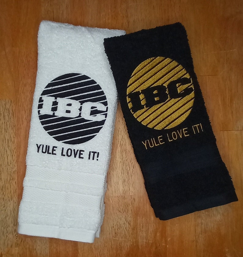 IBC TV Network Logo Yule Love It embroidered hand towels for sale by Beyond Embroidery Art. Scrooged movie Christmas classic.