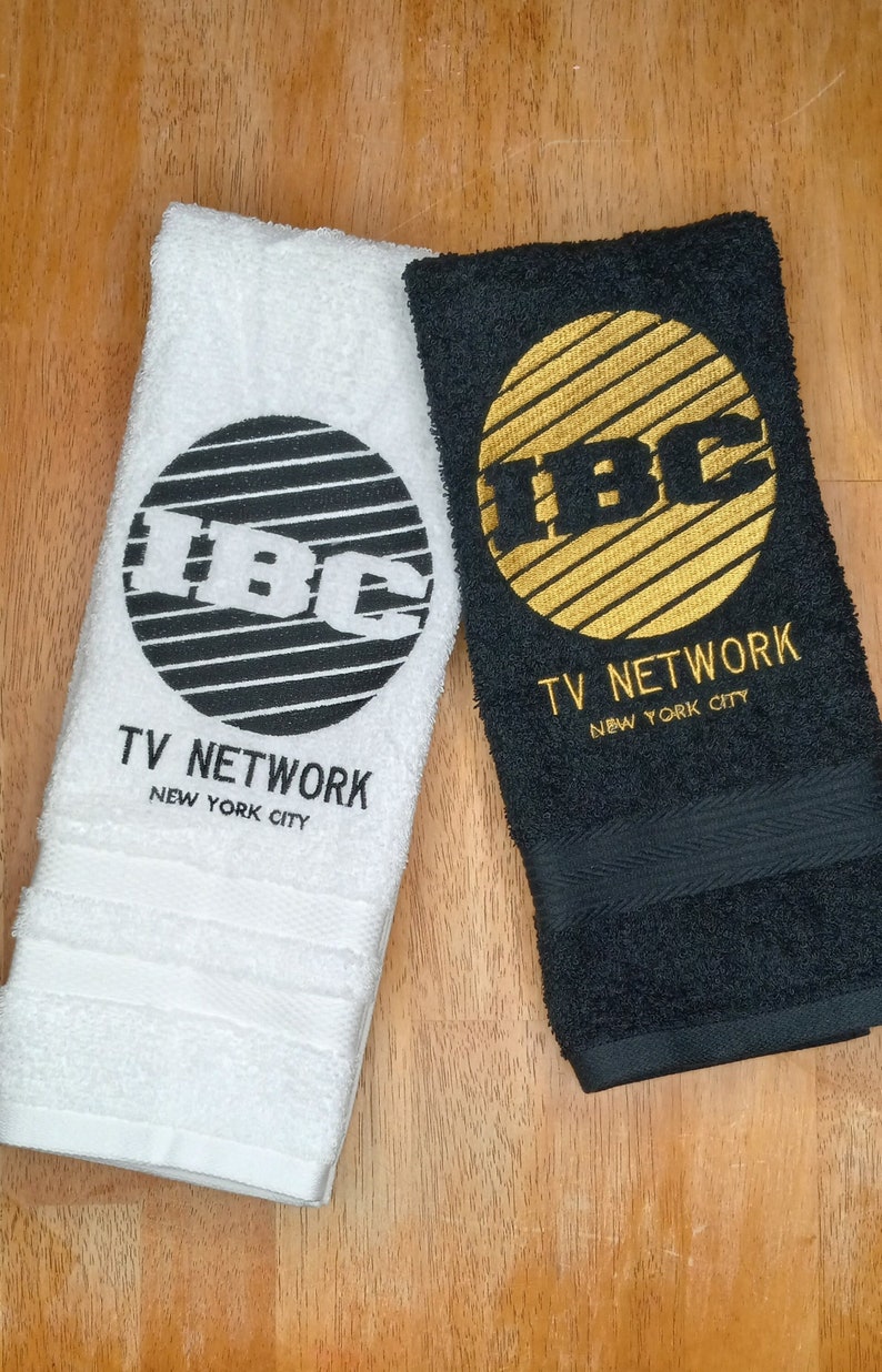 IBC TV Network Logo Yule Love It embroidered hand towels for sale by Beyond Embroidery Art. Scrooged movie Christmas classic.