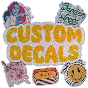 May include: A collection of custom decals with various designs, including a hot dog, a smiley face, a cherry blossom branch, a woman with a cat, and a text design that says "Garden More Stress Less". The decals are all on a white background with a glittery finish.