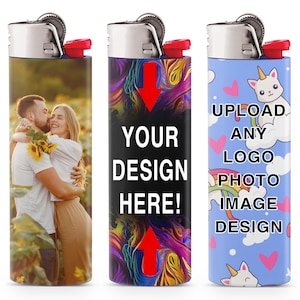 May include: Three custom lighters with silver tops and red ignition buttons. One lighter features a photo of a couple, another has the text "YOUR DESIGN HERE!", and the third displays a unicorn design with the text "UPLOAD ANY LOGO PHOTO IMAGE DESIGN".