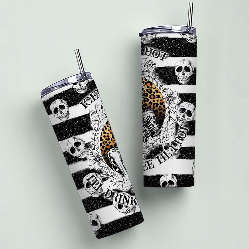 May include: Two black and white striped stainless steel tumblers with a skull and crossbones design. One tumbler says "I'll Drink Coffee Till I'm Hot" and the other says "Hot Coffee Lot".