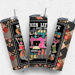 May include: Three stainless steel tumblers with a black background and colorful patchwork fabric design. The tumblers feature the text "When life gives you scraps make quilts".