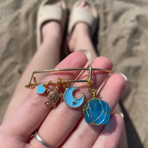 Blue Turtle Moon Charm Bracelet - gold bangle, gold turtle charm, blue moon charm, blue heart charm, wire wrapped blue gem stone