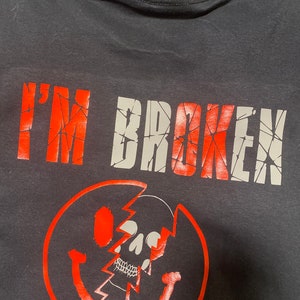 I’m ok, I’m Broken skull in smiley face t-shirt