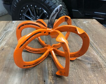 Handcrafted Pumpkin made out of recycled horseshoes for your fall and Halloween decoration and spirit.