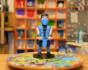 Subzero, Mortal Combat, uchwyt na telefon, uchwyt na joystick, stojak na kontroler, wystrój pokoju, wystrój biura