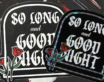 May include: Two black and white tombstone-shaped stickers with the text "So Long and Good Night" in a gothic font. The stickers have red roses on the left side.