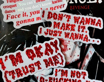 May include: Five red glitter stickers with various phrases. The stickers say "I'm okay (trust me)", "I'm not o-fucking-okay", "Don't wanna make it. I just wanna...", and "Face it, you're gonna never".