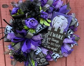 Wreath for Halloween enthusiast, Black and purple, large and eerie Halloween wreath with full moon over cemetery scene, Haunting wreath