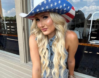 Amerikanische Flaggen-Hut auf weißem Stroh