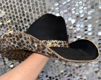 Black suede cowboy hat with leopard rhinestones