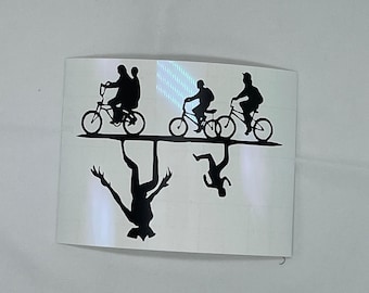 Riding bike with upside down decal