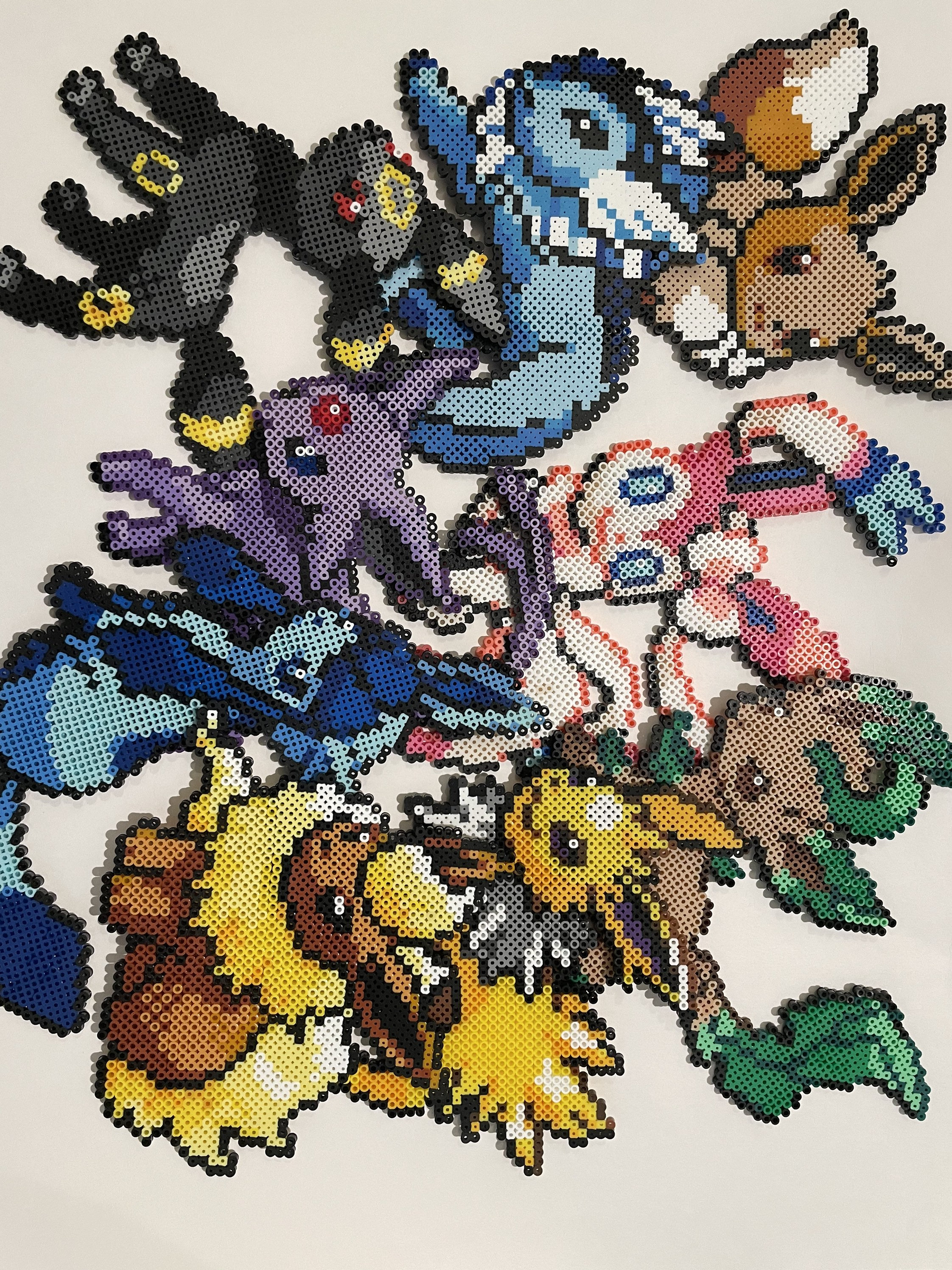 Chaveiro Pokemon Evolução Eevee, Vaporeon Glaceon Leafeon Espeon Jolteon  Flareon Umbreon (Hama Beads/ Pixel Art/ Perler Beads/ Pixel Arte) -  Escorrega o Preço