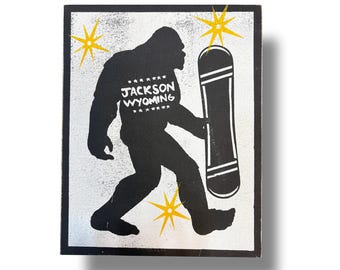 Jackson Hole Wyoming Sasquach holding snowboard-  funny screen printed sign 7 x 9