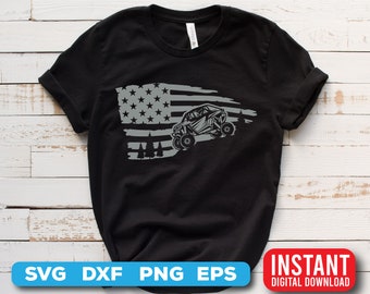 May include: Black t-shirt with a gray graphic of an off-road vehicle driving over a stylized American flag.