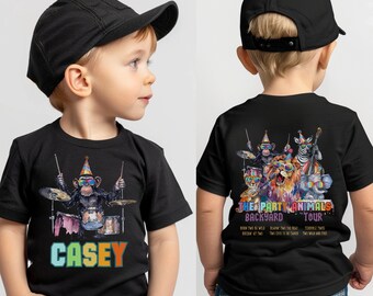 May include: Black t-shirt featuring a colourful illustration of a monkey playing drums. The text "The Party Animals Backyard Tour" is printed on the shirt. The name "Casey" is printed on the front of the shirt.