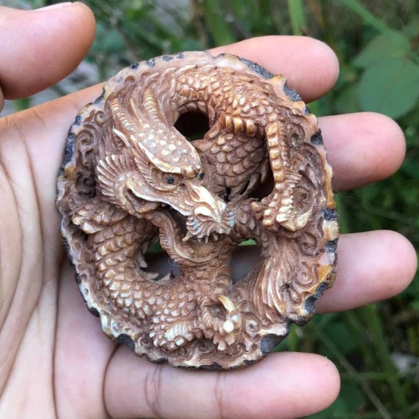 Antler carving - hand carved dragon for pendant from bottom deer antler.