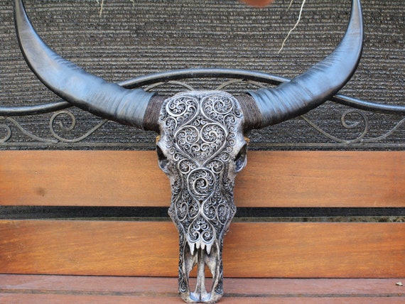 Intricately Hand Carved Buffalo Skulls with Spirals Intricately Hand Carved Buffalo Skulls with Spirals