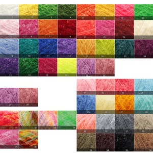 May include: A chart of 56 different colors of yarn, each color is displayed in a square. The yarn is a fluffy, textured type of yarn.