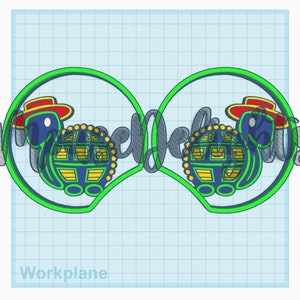 May include: Digital illustration of two cartoon turtles in hats, within green circles. The turtles have blue heads and green shells with yellow and blue details. The word "Welcome" is written in cursive between the circles.