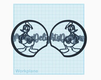 May include: Black outline of two Mickey Mouse ear shapes, each with a Donald Duck character inside a circle. The text "Mouse Delights Designs" is written across the ears. The background is a light blue grid.