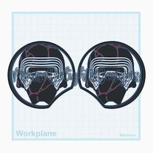 May include: Two black and red Kylo Ren helmet designs in a circular frame. The helmets have a cracked pattern and white horizontal lines. The image is on a white background with the words "Workplane" and "Millimeters" at the bottom.