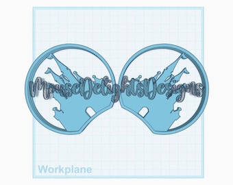 May include: A pair of light blue mouse ears with a silhouette of Cinderella's castle in the centre. The text "Mouse Delights Designs" is visible on the ears.