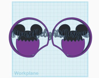 May include: Purple and black mouse ears with an egg design inside. The ears are made of felt and have a wire frame. The text "Mouse Delights Designs" is visible in the background.