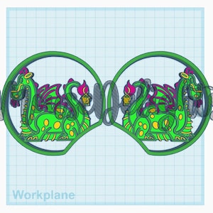 May include: A green and purple dragon design with yellow accents is featured in a circular frame. The design is repeated, connected by a stylized word. The word "Workplane" is printed at the bottom.