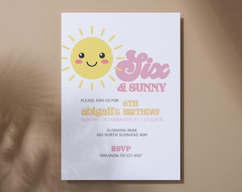 May include: A white birthday invitation card featuring a yellow smiling sun graphic and pink text that reads Six & Sunny. The card includes details for Abigail's 6th birthday on Sunday, October 6th at 1 o'clock at Sunshine Park, 400 North Sunshine Way.