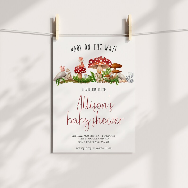 May include: A baby shower invitation with a woodland theme. The invitation features a watercolor illustration of mushrooms, a squirrel, and a raccoon. The text on the invitation reads "Baby on the Way!" and "Allison's baby shower". The invitation also includes the date, time, location, and RSVP information.