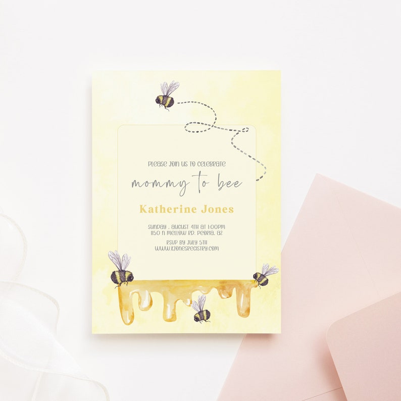 May include: A yellow baby shower invitation with a watercolor illustration of bees and honey dripping. The text reads "Please join us to celebrate mommy to bee Katherine Jones Sunday, August 4th at 1:00pm 1150 N. Meadow Rd. Peoria, AZ RSVP by July 5th www.ourregistry.com"