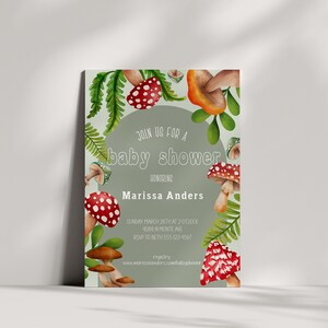 May include: A baby shower invitation with a watercolor illustration of mushrooms and greenery. The text reads "Join us for a baby shower honoring Marissa Anders".
