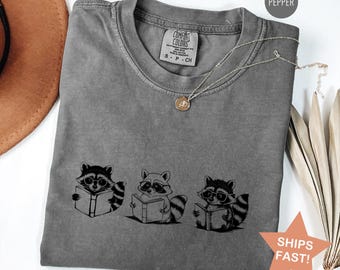 Comfort Colors® Funny Raccoon Reading Shirt, Cute Raccoon Shirt for Book Lovers, Bookworm Shirt, Book Lover T Shirt, Reading Teacher T-Shirt