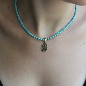 Turquoise Beaded Necklace with Bronze Jesus Pendant