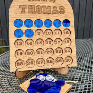Personalised, engraved Football Reward Tracker with mirrored acrylic footballs, pouch and stand.