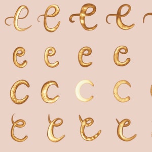 May include: A set of 20 gold foil letter stencils for calligraphy and lettering. The stencils include the letters 'e' and 'c' in various styles.