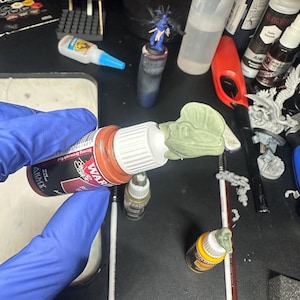 dilophosaurus  Swatch Caps paint bottle toppers