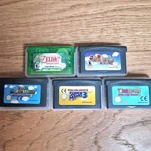 マリオ vs. ゼルダ GBA コレクション：11 ゲームのお得なバンドル - 任天堂ゲームボーイアドバンスカートリッジとケース。マリオワールド、ヨッシーアイランド、ミニッシュキャップなど。