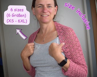 May include: A woman wearing a dusty rose crochet shrug. The shrug is open-fronted with a delicate, open weave pattern. The image includes text indicating six sizes are available, ranging from XS to 6XL, and the phrase "size inclusive".