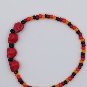 Red multicolored bead bracelet with red skulls, Halloween jewelry, Halloween bracelets, skull jewelry.
