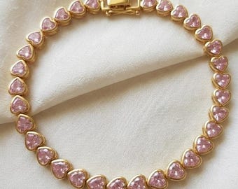 Bracciale tennis con zaffiro rosa a forma di cuore, incastonato in argento sterling 925, gioiello minimalista.