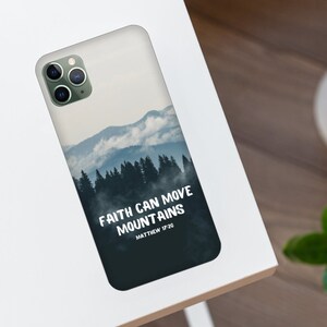 May include: A phone case with a misty mountain landscape and the text "Faith can move mountains Matthew 17:20".