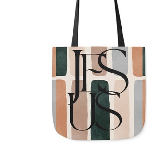 May include: A tote bag with a geometric pattern in shades of brown, green, and gray. The word "JESUS" is printed in black letters on the bag.