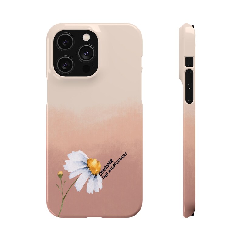 May include: A pink and white phone case with a watercolor-style daisy and the text "Consider the wildflowers".