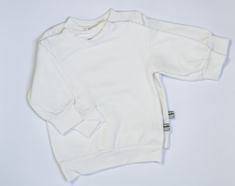 Newborn Hoodie Milk. Oversize Baby Sweater made of soft cotton jersey. Ideal as initial equipment or gift for birth, baby shower.