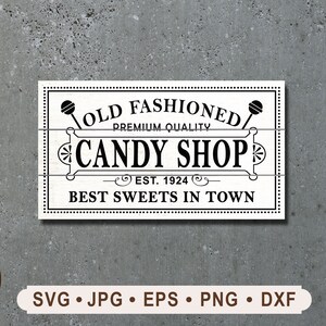 May include: Black and white sign with the text "Old Fashioned Premium Quality Candy Shop Est. 1924 Best Sweets in Town" with a lollipop graphic on each side.